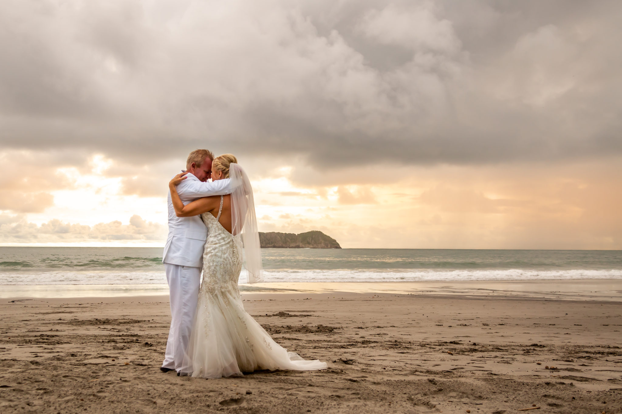 Wedding couple on the beach, portrait in natural light