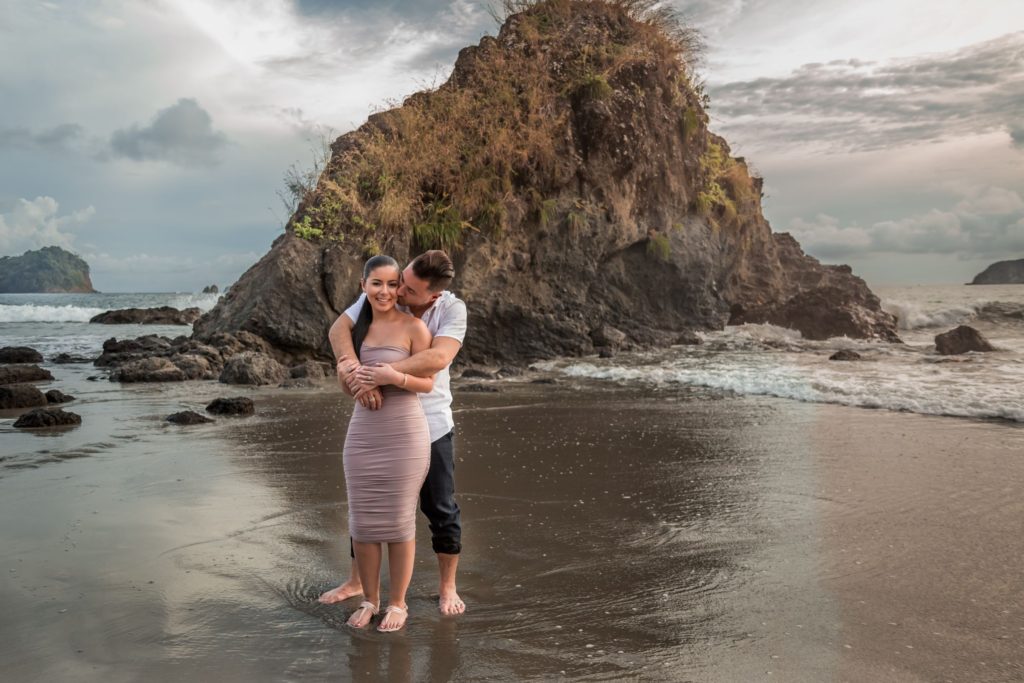 Couple portrait in natural light on the beach