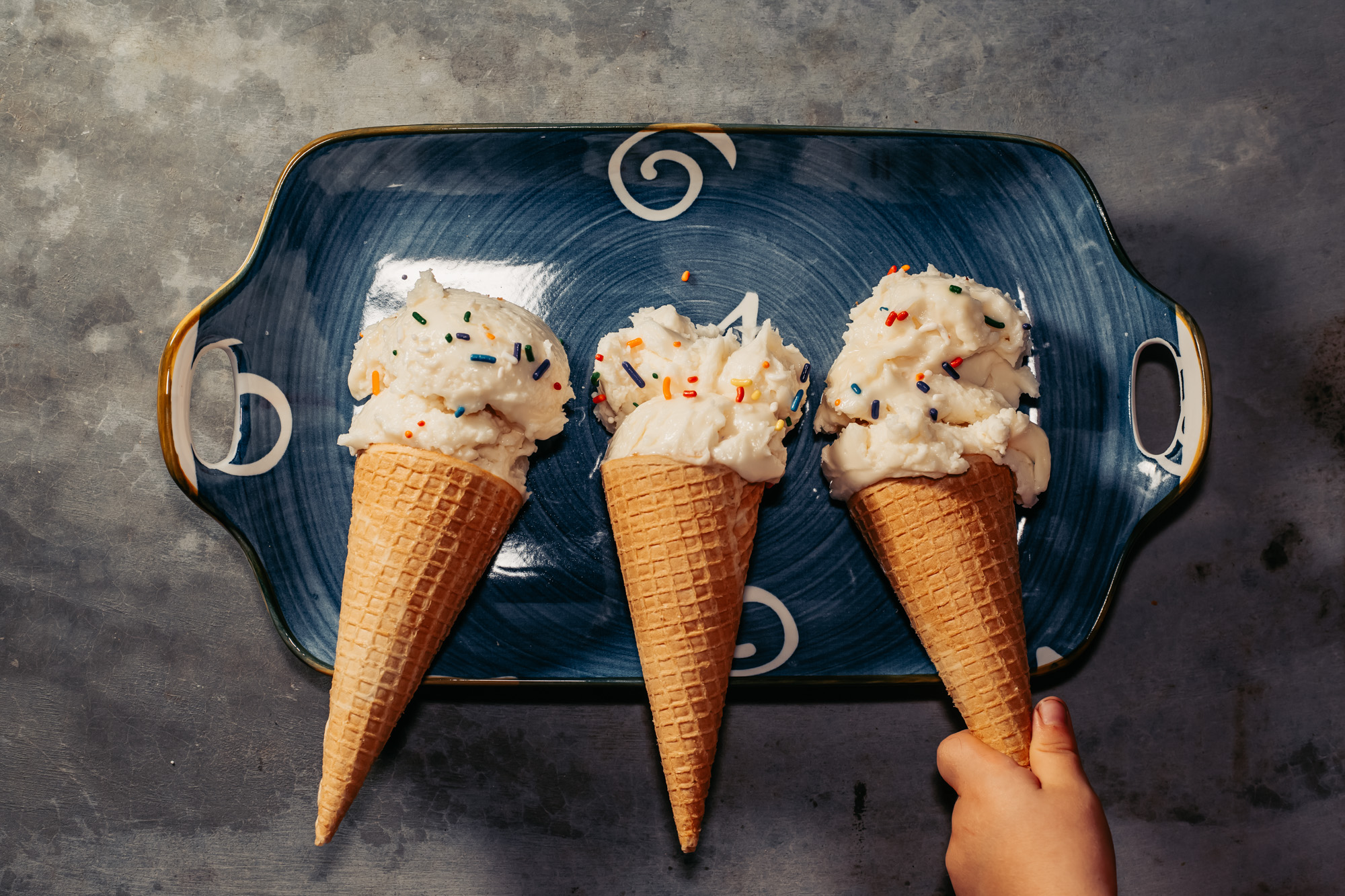 three ice cream cones on a platter food photography costa rica