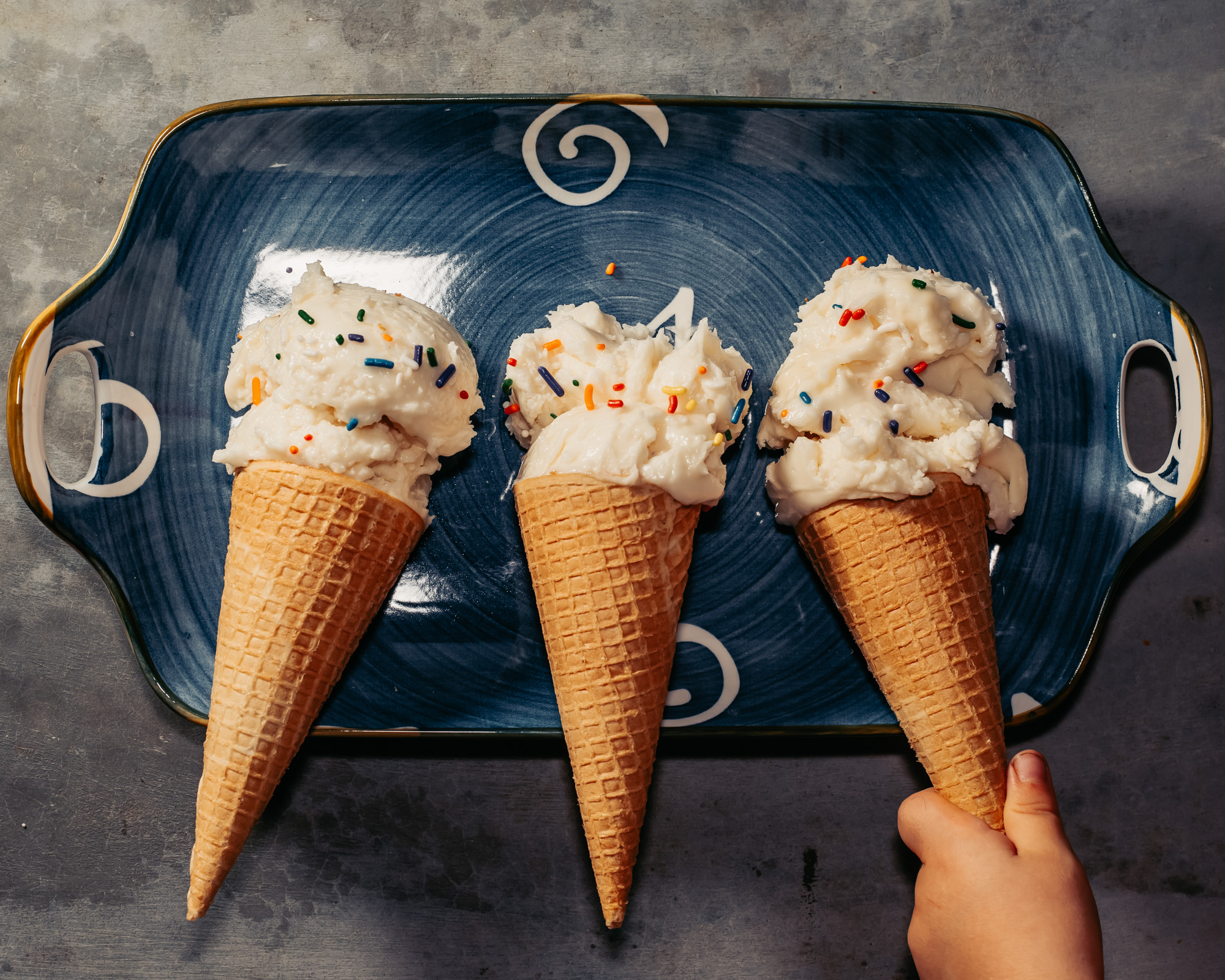 three ice cream cones on a platter food photography costa rica