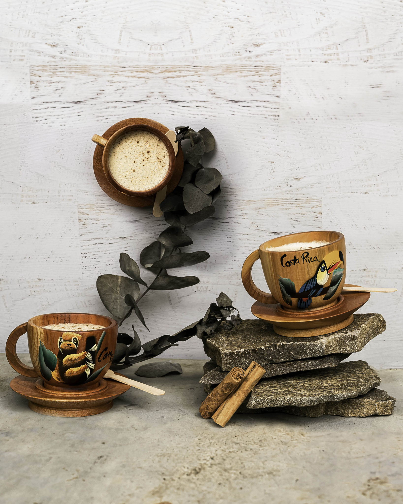 Off the wall image of painted wooden cups