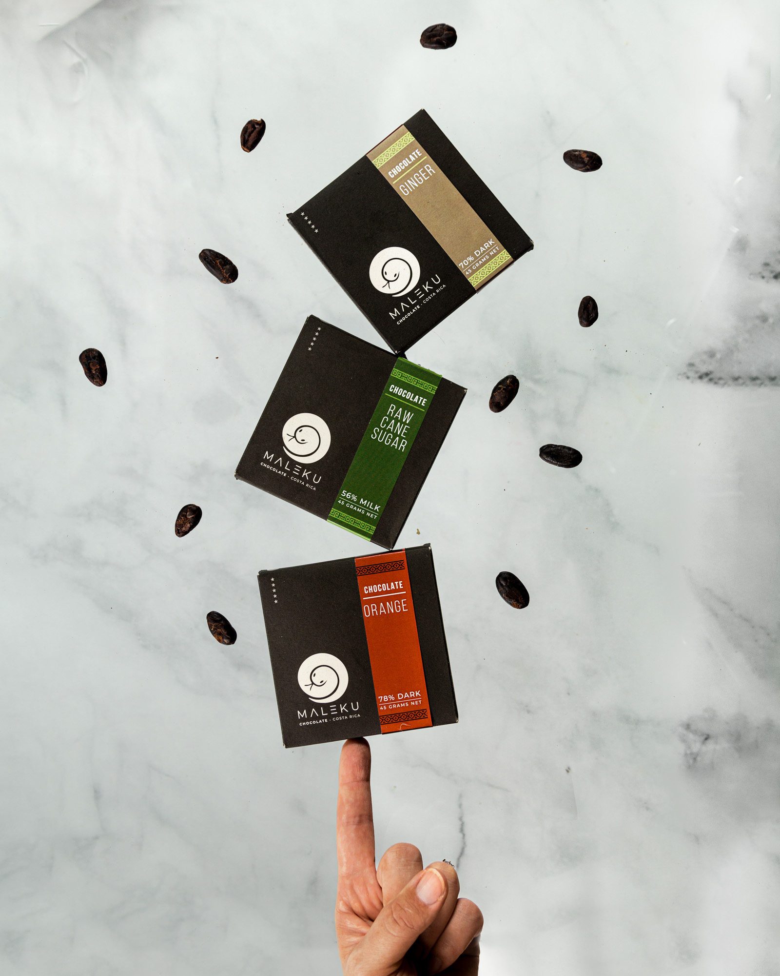 Chocolate bars balanced on a finger